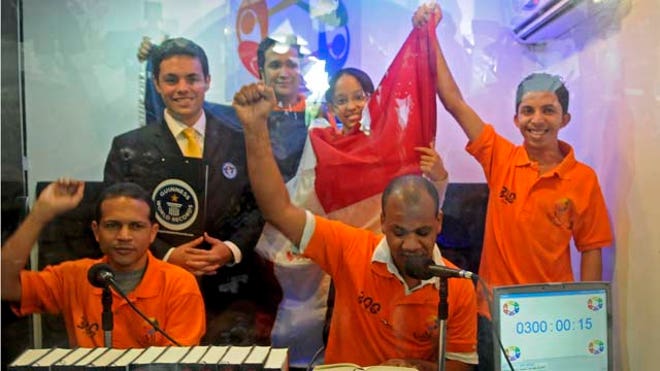 5 Dominican students reading record.jpg